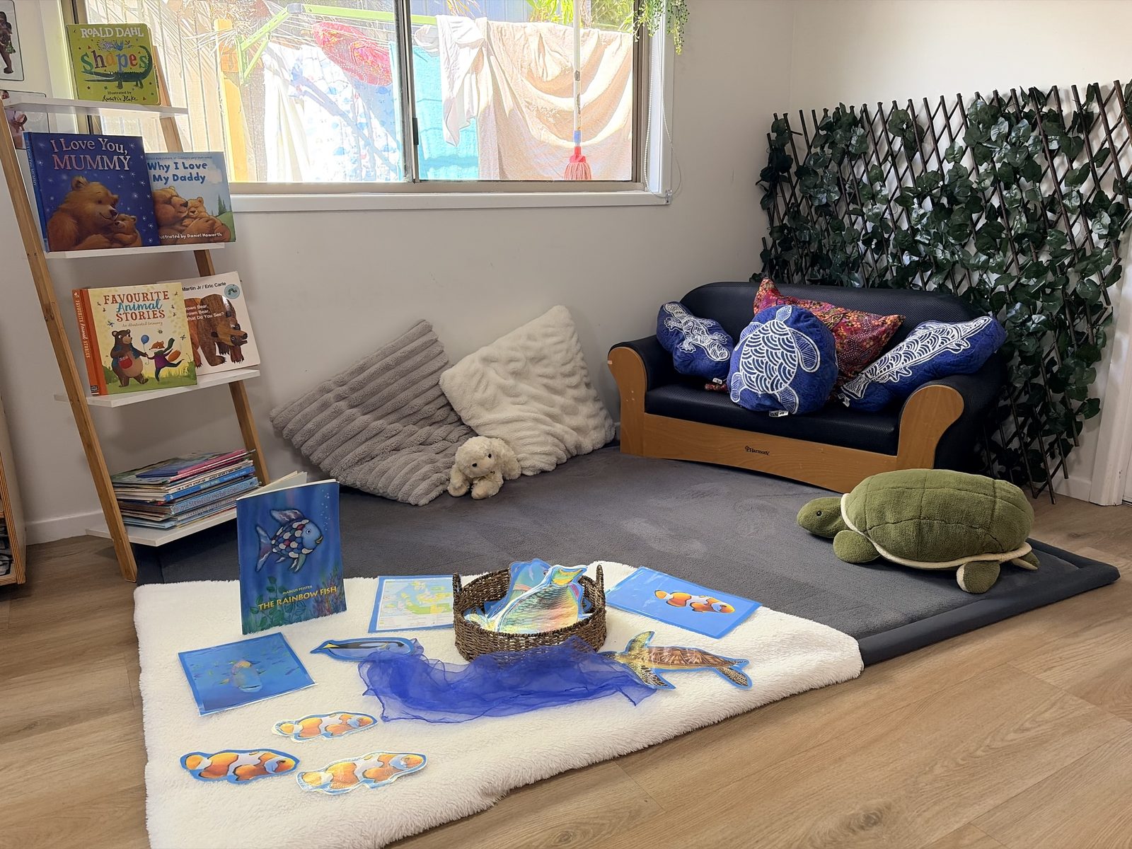 The cosy reading nook in the Pre-Kindy room